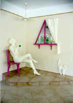 Interior sculpture "Girl on chair". 1998. Gypsum, wood, concrete.